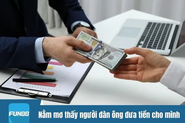 Nằm mơ thấy người đàn ông đưa tiền cho mình